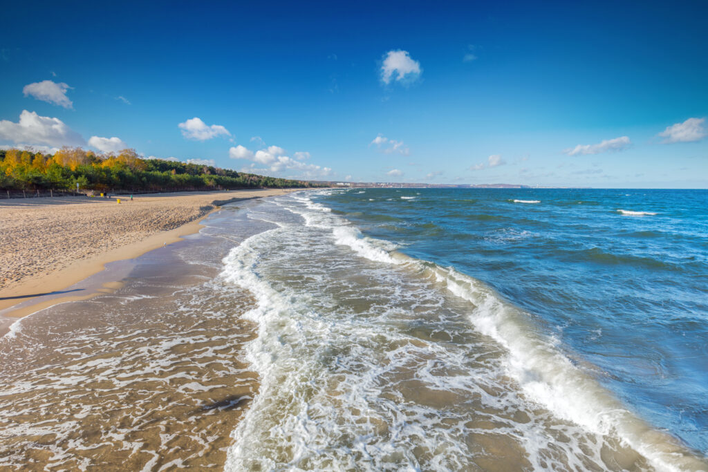 Baltic sea and the Gulf of Danzig coast in Poland. Blue sunny sky.